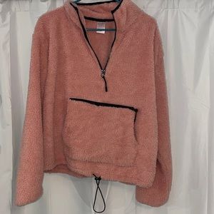 Pink fuzzy sweater with adjustable string and zipper pocket